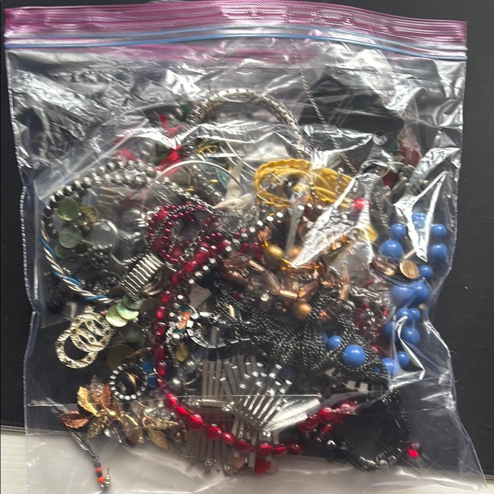 Mystery Jewelry Bag with Red, Blue, and Gold Accents